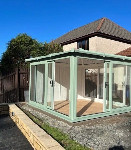 Sage green garden building